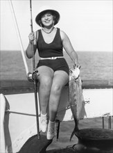 Woman With Catch Of The Day