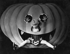 Halloween Girl And Her Pumpkin