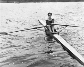 Man Rowing A Scull