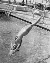 Woman Doing A Back Dive