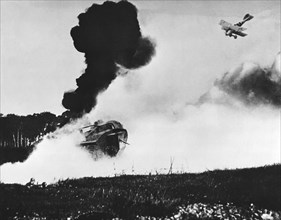 German Biplane Attacks Tank