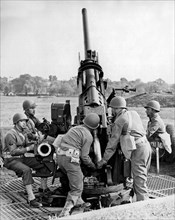 United States:  March 23, 1944.
Troops undergoing artillery training.