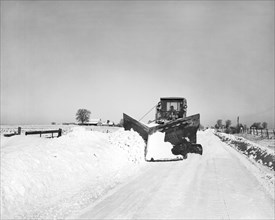 Snow Plow Clearing Roads