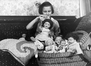 Girl With Dolls