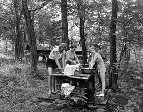 East Otis, Massachusetts:  c. 1925.
Wash day in the woods at the Bonnie Brae Girl Scout Camp in