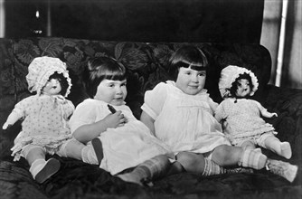 Twins With Dolls