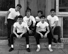 Teenage Boys On A Step