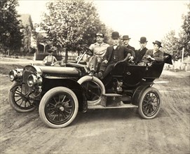 Men In An Early Auto