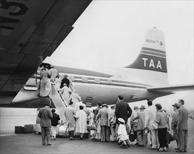 Passengers Boarding Airplane