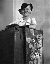 A Woman With Her Steamer Trunk