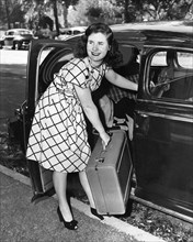 Woman With Suitcase