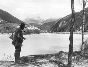 Man Fishing In Switzerland