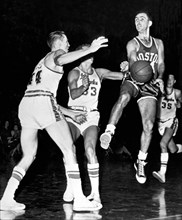 Bob Cousy Passes Basketball