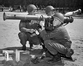 United States: c. 1941.
Recruits undergoing bazooka training for World War II.