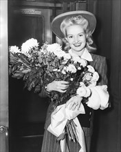 Betty Grable With Flowers