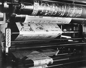 A Newspaper Being Printed