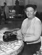 A Woman Journalist Typing