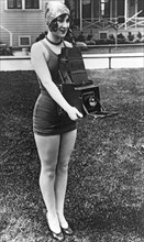 A Woman And Her Camera