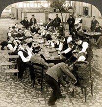 Marburg, Germany:  c. 1895.
University students from Marburg enjoying talk, song, and beer around