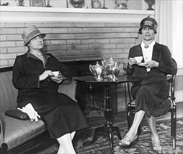 Washington, D.C.:  June 14, 1926.
Two Washington, DC, society women having tea as they plan opening