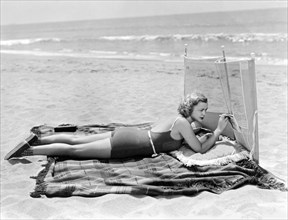 Woman With A Beach Screen