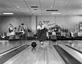 Young Woman Bowling