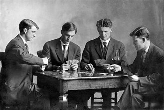 Four Men Playing Cards