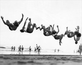 Six Men Doing Beach Flips