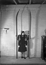 A Woman With Nine Foot Skis
