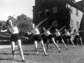 Six Girls Throwing Javelins