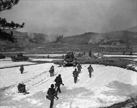 Korea:  February 4, 1951.
Soldiers of the United States 1st Calvary Division move out on an assault