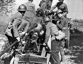 French soldiers fire their 155mm artlillery piece at German positions on the Western Front.