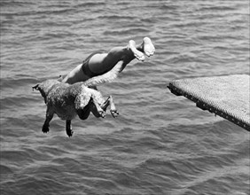 Boy And His Dog Dive Together