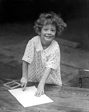 A Young Girl Drawing