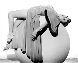 Woman Lying On Exercise Ball