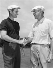Two Golfers Shake Hands