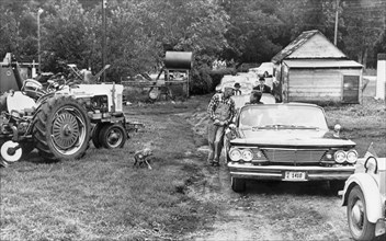 Kennedy Visits Iowa Farmer