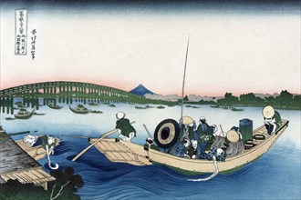 Sunset across Ryogoku Bridge from the Bank of the Sumida River at Onmayyagashi 1830
