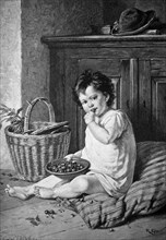 Child eating cherries