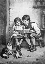 Children reading a book