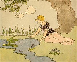 Girl sits by pond and addresses a frog 1910