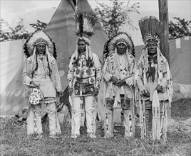 Four Native American Chiefs in Feathered War Bonnets & Buckskins as decorated Native Garb 1923
