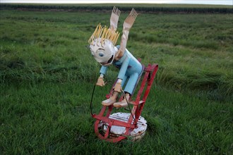 Porter Sculpture Park, Montrose, South Dakota; Child on Sled; Located just off Interstate 90 in the South Dakota Drift Prairie, about 25 miles west of Sioux Falls. Many of the sculptures, in the style...