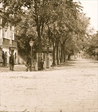 Charleston looking east from the corner of Meeting Street & Broad Street. 1865