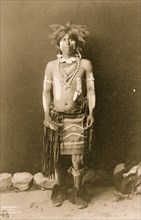Snake dancer in costume 1900