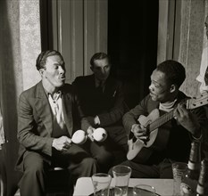 Itinerant musicians in a bar. Rio Piedras, Puerto Rico 1937