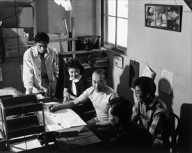 Roy Takeno and staff meeting 1943