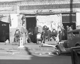 Sidewalk scene in Selma, Alabama 1936