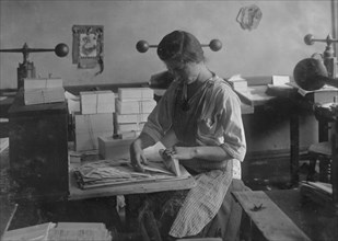 Packing the finished envelopes at Embossing shop.  1917