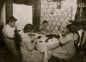 Italian family makes willow plumes from her tenement apartment 1911